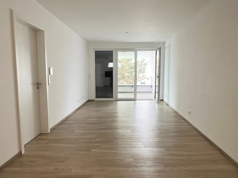 Moderne 2-Zimmer-Wohnung mit EBK, PKW-Stellplatz und Terrasse in zentraler Lage - Foto 2