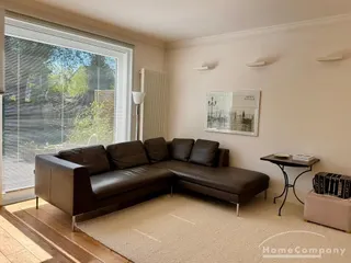 Großzügige möblierte Gartenwohnung mit Kamin und Terrasse in Groß Flottbek