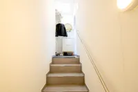 Treppenaufgang mit Garderobe