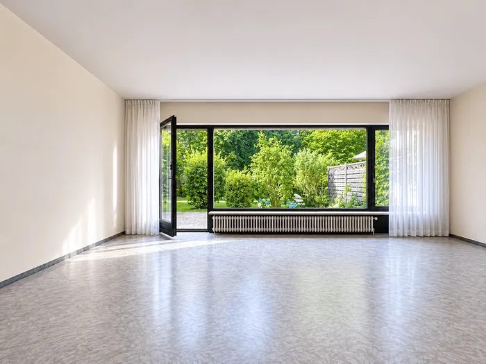 Wohnzimmer mit Ausgang zur Süd/West-Terrasse