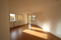 Wohnzimmer mit Balkonzugang