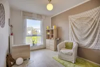 Schlafzimmer II im OG mit Blick in den Garten