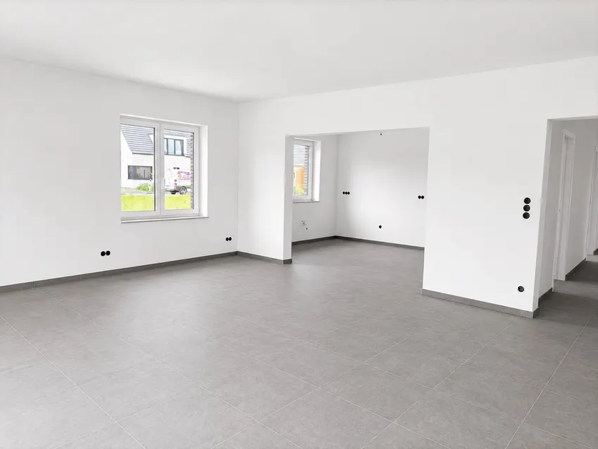 Wohnzimmer mit Blick in die Küche j