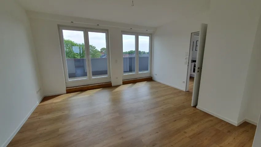 Wohnzimmer mit Balkon