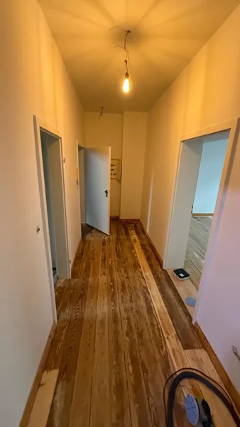 Erstbezug nach Sanierung: Exklusive 3 Zimmer-Wohnung mit Balkon, Dielen und Kaminanschluss! - Foto 5