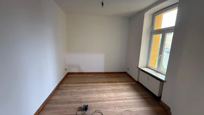 Erstbezug nach Sanierung: Exklusive 3 Zimmer-Wohnung mit Balkon, Dielen und Kaminanschluss! - Foto 2