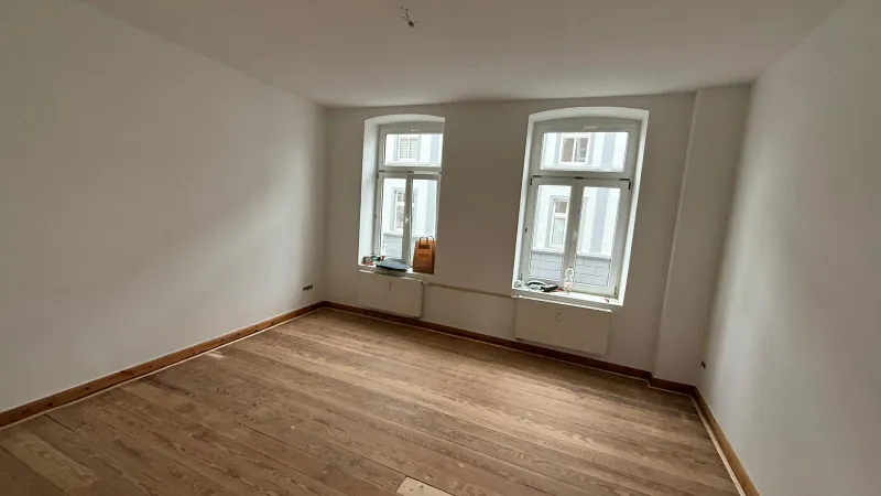 Erstbezug nach Sanierung: Exklusive 3 Zimmer-Wohnung mit Balkon, Dielen und Kaminanschluss! - Foto 1