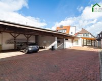 Ansicht hinten mit Carport und Garage