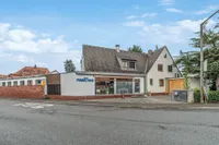 Haus mit Laden und Werkstatt