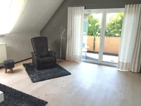 Wohnzimmer Obergeschoss, mit Zugang zum Balkon