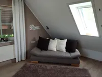 Ruhebereich Fitnessraum im Dachgeschoss