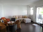 Wohnzimmer mit direktem Balkonzugang