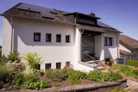 Schlafzimmer mit Balkonzugang