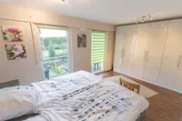 Schlafzimmer mit Balkonzugang