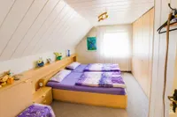 Erstes Schlafzimmer im DG