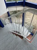 Wendeltreppe zur Wohnung