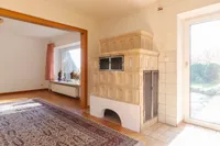 Wohnzimmer EG mit Kachelofen