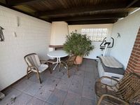 überdachter Freisitz mit Kamin