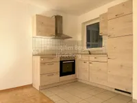 Kochbereich mit Einbauküche