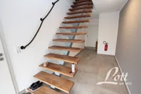Treppe in die Dachgeschosswohnung
