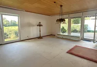 Wohnzimmer mit Zugang zur Terrasse