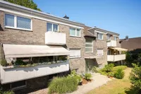 Gut geschnittene 4-Zimmer-Wohnung mit zwei Balkonen und einer Garage in Ratingen-Mitte