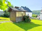 Gartenhaus mit Grillplatz