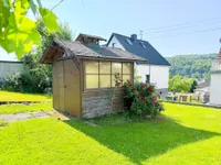 Gartenhaus mit Grillplatz