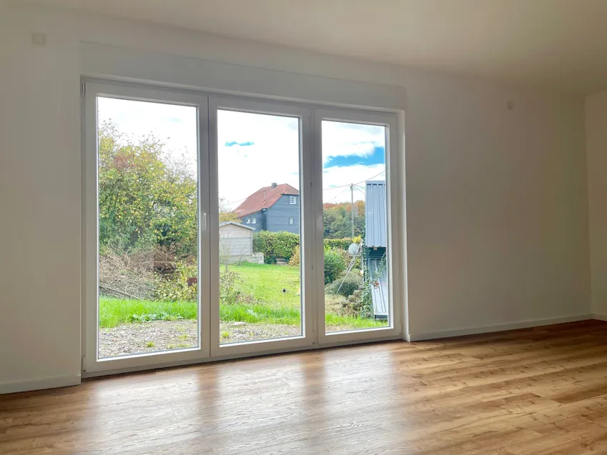 Wohnbereich mit Zugang in den Garten