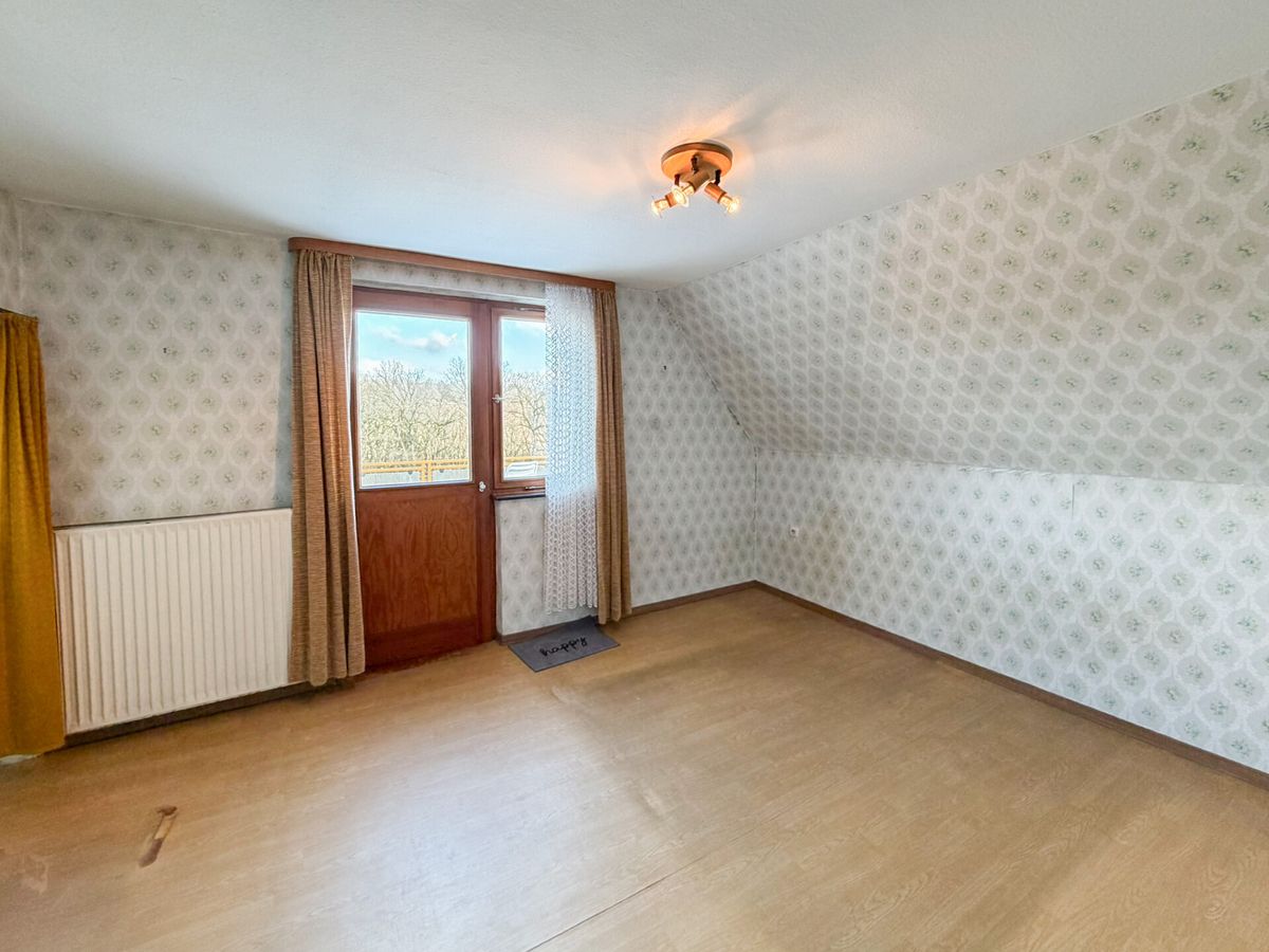 Schlafzimmer mit Zugang zur Dachterrasse