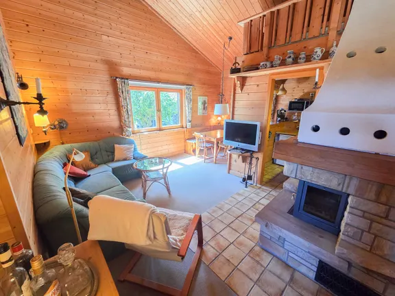 Wohnzimmer mit Kaminofen EG