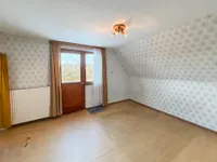 Schlafzimmer mit Zugang zur Dachterrasse