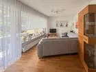 Wohnbereich mit Zugang auf den Balkon