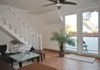 Wohnzimmer mit Balkon