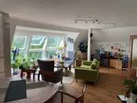 Wohnzimmer mit Glaselement