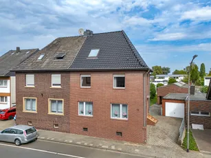 Schiefbahn: Doppelhaushälfte mit Halle und Baugrundstück - Viel Potenzial für Ihre Zukunft.