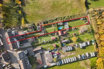 Dreifamilienhaus mit 1500 M² Grundstück.