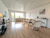 Wohnzimmer Blick zum Balkon