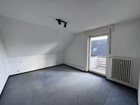 Schlafzimmer mit Balkonaustritt 