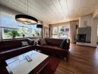 Wohnzimmer mit Terrassenaustritt