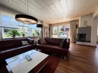 Wohnzimmer mit Terrassenaustritt