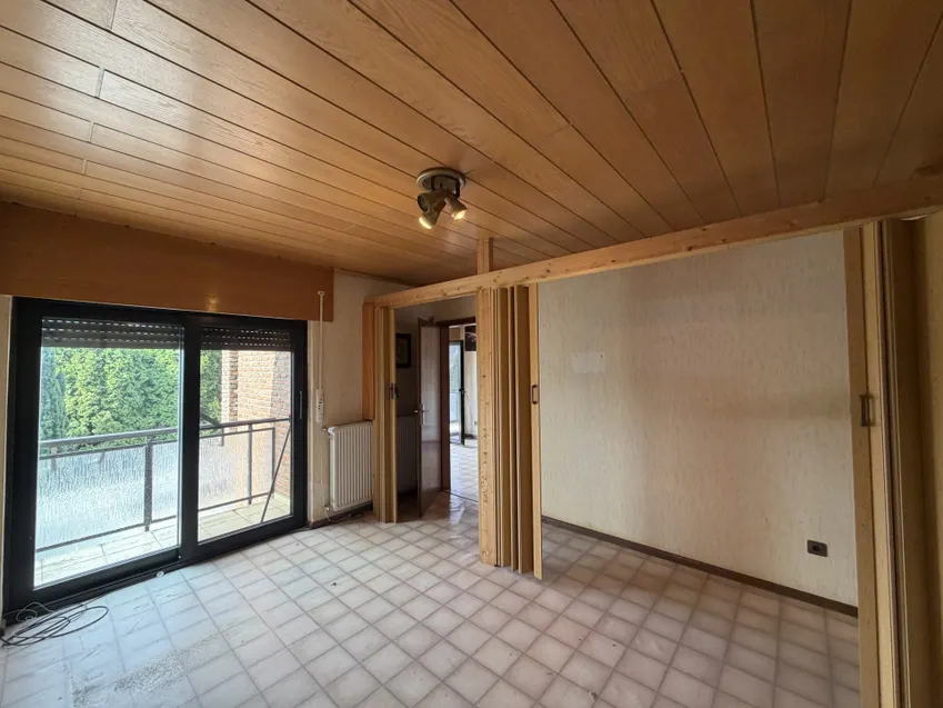 Wohnraum im OG mit Balkonaustritt
