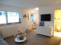 Das Wohn- und Schlafzimmer