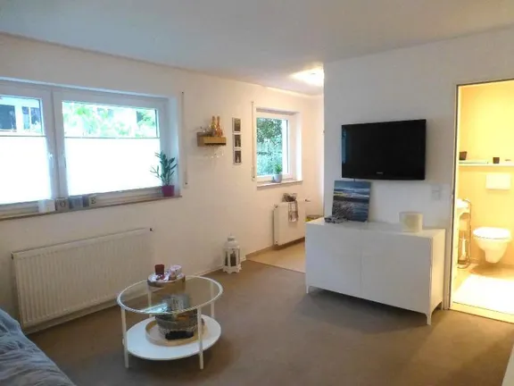 Das Wohn- und Schlafzimmer