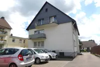 Hausansicht mit Balkon