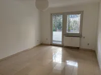 Schlafzimmer mit Balkonzugang