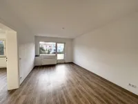 Wohnzimmer mit Balkon