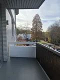 Balkon mit Blick auf die Haumannplatzwiese
