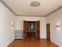 Esszimmer mit Blick zum Wohnzimmer