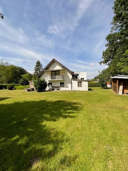 Viel Platz zum Leben und Entfalten: Einfamilienhaus mit Wintergarten, Garage und Werkstatt!
